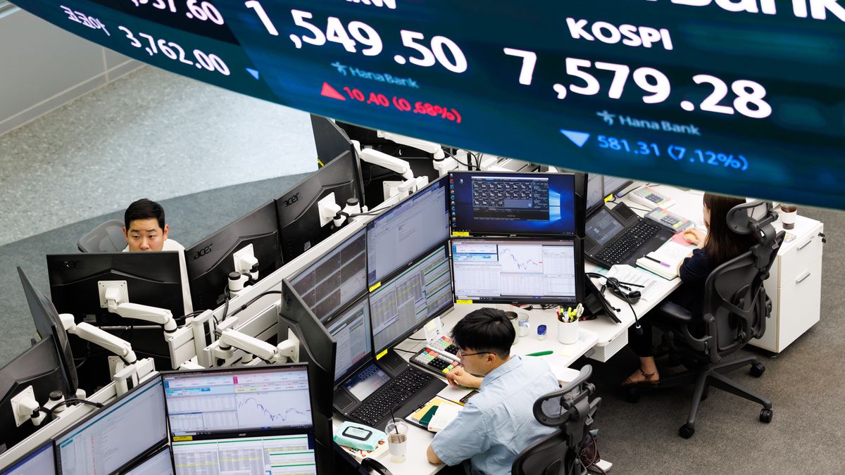Foreign exchange dealers work inside a trading room at Hana Bank in Seoul, South Korea, on Monday, June 8, 2026. South Korean stocks plunged, imperiling the world's biggest rally, as investors pulled back from artificial intelligence bets that have fueled the global bull market in equities. Photographer: SeongJoon Cho/Bloomberg via Getty Images