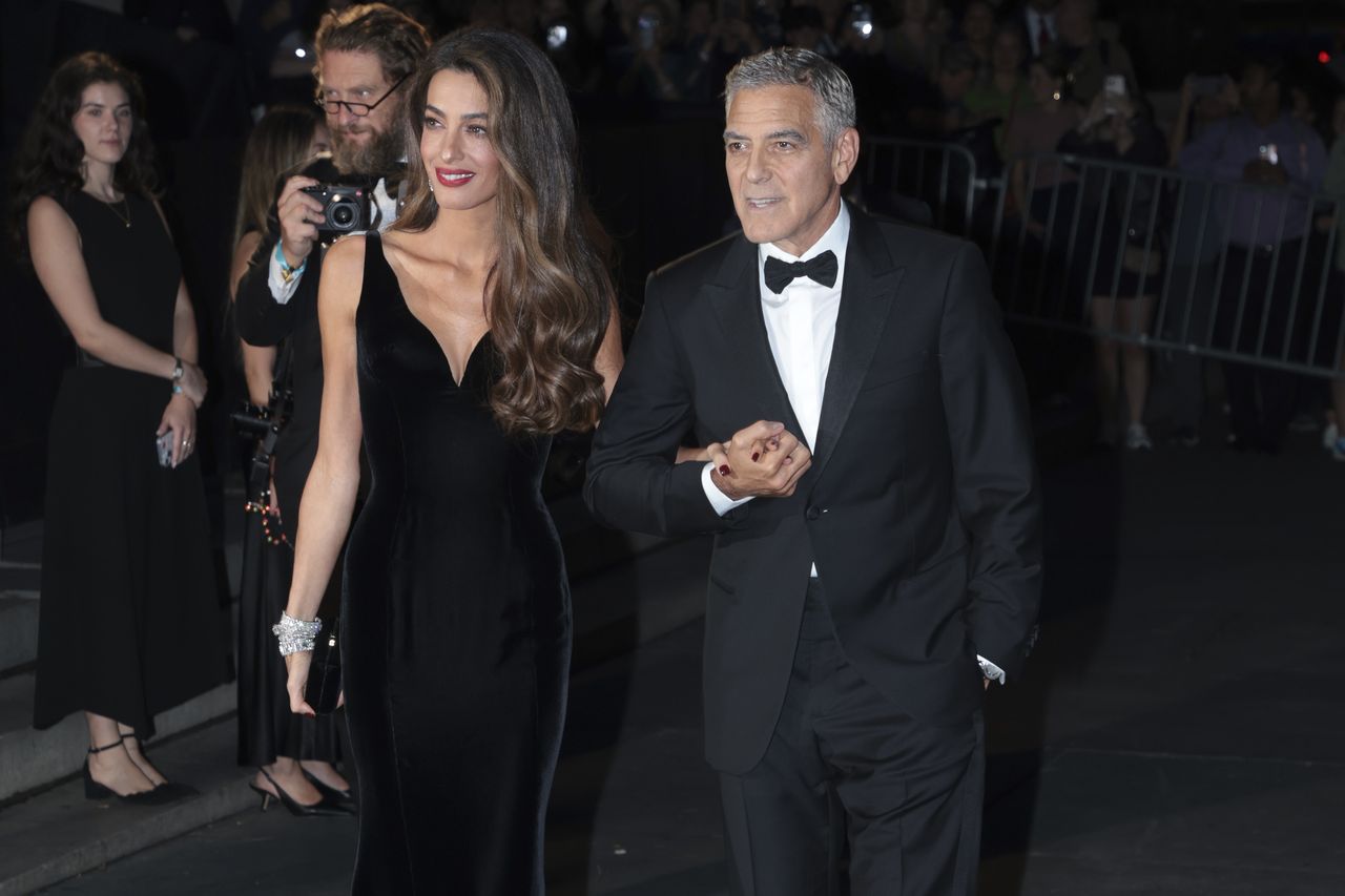 NEW YORK, NEW YORK - SEPTEMBER 26: Amal Clooney and George Clooney attend the 2024 Albie Awards presented by the Clooney Foundation for Justice at the New York Public Library on September 26, 2024 in New York City. (Photo by Jean Catuffe/GC Images)