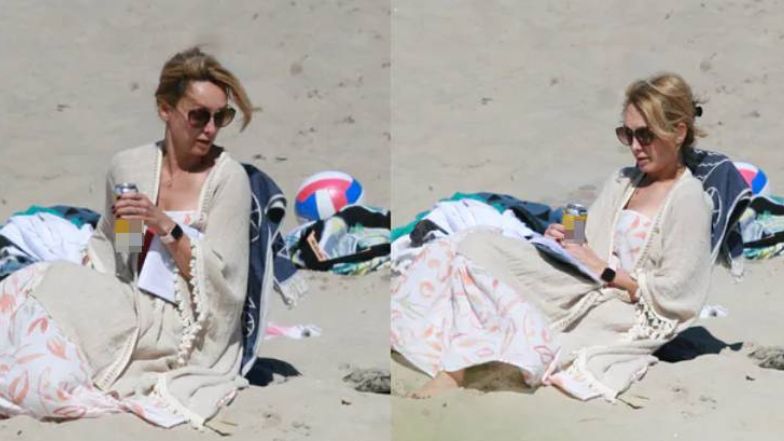 Anna Kalczyńska pije piwo na plaży i fotografuje pociechy