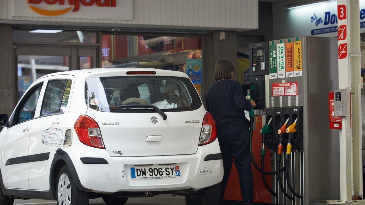 A woman prepares t refill her car in toulouse .The French government prepares to announce a plan to help consumers to pay their bill of fuel as energy prices skyrocketed after the Covid-19 pandemic. The price of fuel is nearly an all time high. The Macron's government want to subsidy the use of fossil fuels to help people. They fear a resumtion of the Gilets Jaunes protests which began nearly three years ago about the price of gasoline as the french campaign for presidential election will really begin in the next months. Toulouse. France. October 20th 2021. (Photo by Alain Pitton/NurPhoto via Getty Images)