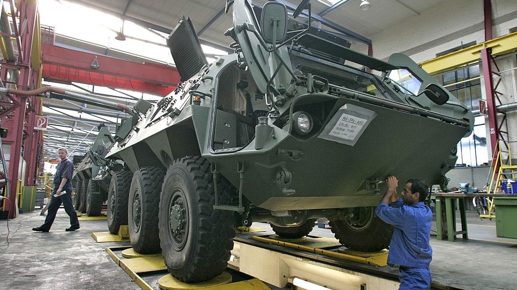 A worker adjusts a Fox armoured vehicle at Rheinmetall Lands
GERMANY - OCTOBER 11:  A worker adjusts a Fox armoured vehicle at Rheinmetall Landsysteme GmbH in Kassel, Germany, Tuesday, October 11, 2005. Rheinmetall Landsysteme GmbH is a division of Rheinmetall Defence Group. The company is one of Europe's suppliers of light- and medium -weight wheeled and tracked armoured vehicles, and has supplied more than 14,000 vehicles and subsystems to customers in 36 countries, according to the company.  (Photo by Jochen Eckel/Bloomberg via Getty Images)
Bloomberg
FUCHS, TANK