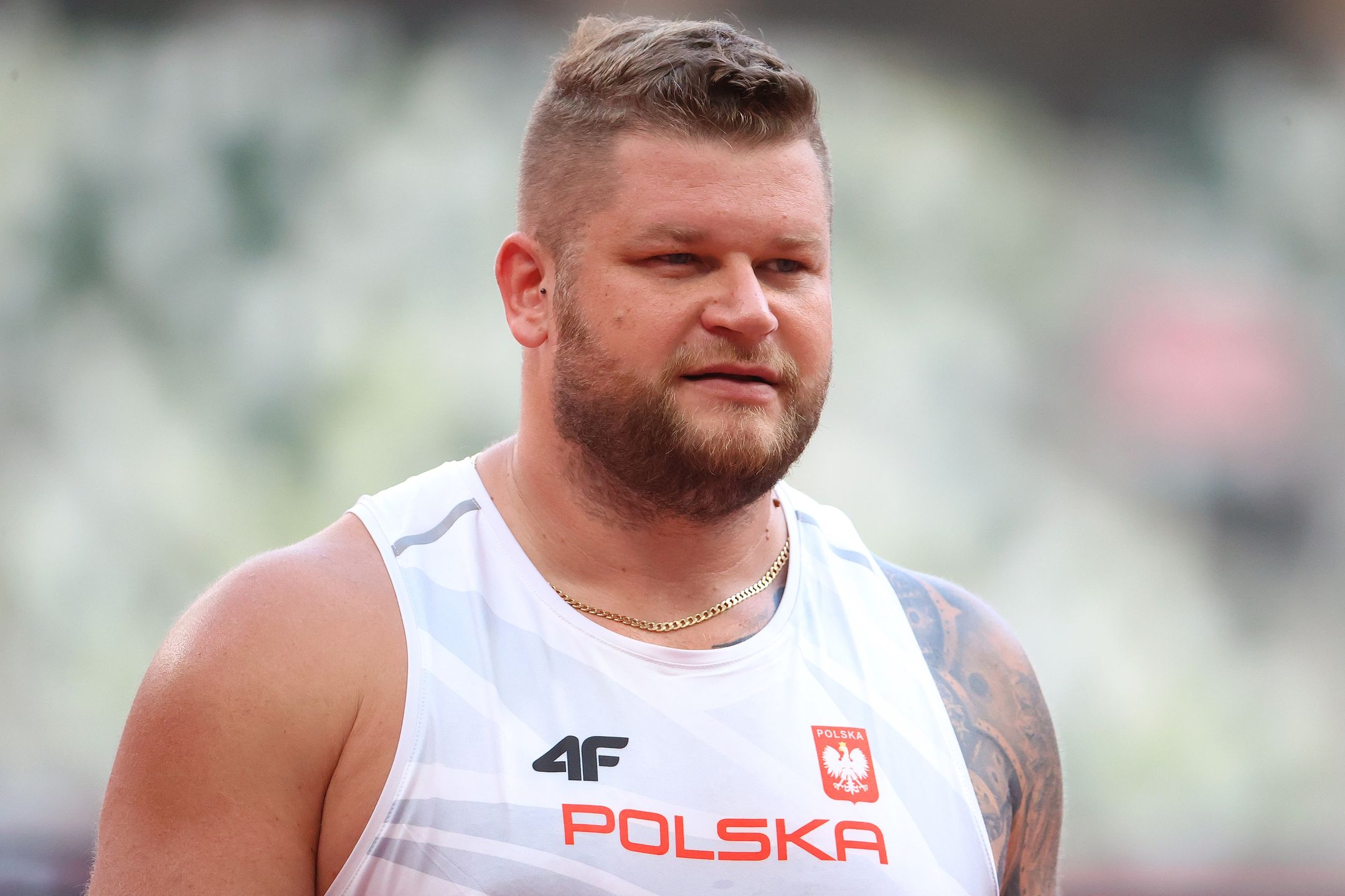 TOKYO, JAPAN - AUGUST 02: Pawel Fajdek of Team Poland looks on during the Men's Hammer Throw Qualification on day ten of the Tokyo 2020 Olympic Games at Olympic Stadium on August 02, 2021 in Tokyo, Japan. (Photo by Abbie Parr/Getty Images)