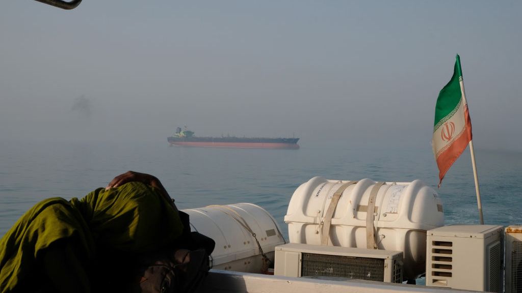 The Persian Gulf Islands
HORMUZ ISLAND, IRAN - MAY 2, 2017: A foreign tourist rests on a passenger boat with the Iranian flag amass in the waters of the Strait of Hormuz on May 2, 2017 near Hormuz Island, Iran. An oil tanker is seen on the move in the background. (Photo by Kaveh Kazemi/Getty Images)
Kaveh Kazemi