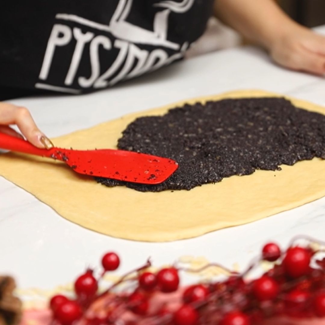 I spread poppy seed filling on the yeast dough.