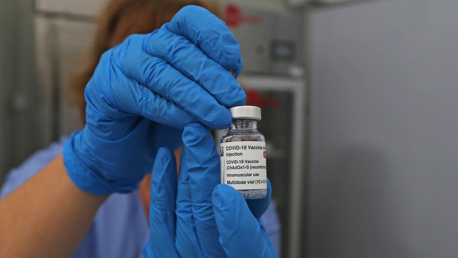 CASERTA, ITALY - 2021/03/01: A vial of AstraZeneca vaccine against the Covid-19 virus, being prepared in the vaccination center, inside the Ferrari Orsi military barracks, to vaccinate people. (Photo by Marco Cantile/LightRocket via Getty Images)
