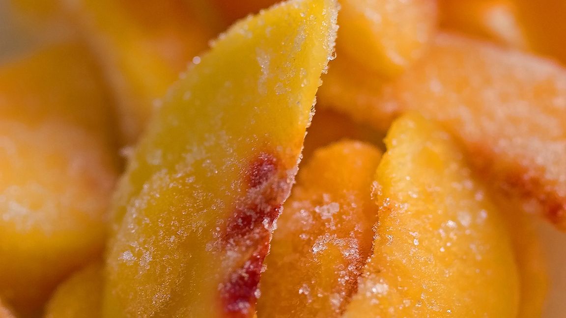 Mrożone brzoskwinie w plastrach z dodatkiem cukru