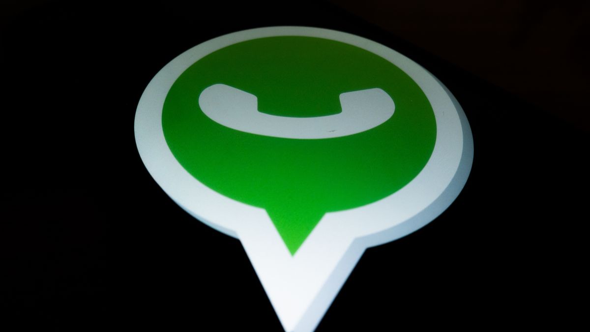A Whatsapp logo displayed on a smartphone is seen in L'Aquila, Italy, on April 10th, 2024. On April 11th, Whatsapp will introduce updates to allow Whatsapp users to receive message from other apps.  (Photo by Lorenzo Di Cola/NurPhoto via Getty Images)