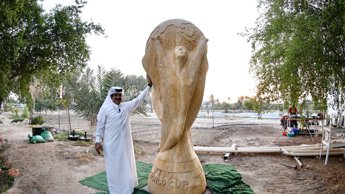DOHA, QATAR - OCTOBER 08: A general view of the "World Cup" statue, made by Turkish sculptors with the initiative of Qatari businessman Hamad Al Suwaidi to support the 2022 FIFA World Cup in Doha, Qatar on October 08, 2022. The sculpture made of travertine stone, weighing 4 tons and height of 2.8 meters, was completed in about 2 years. (Photo by Mohammed Dabbous/Anadolu Agency via Getty Images)