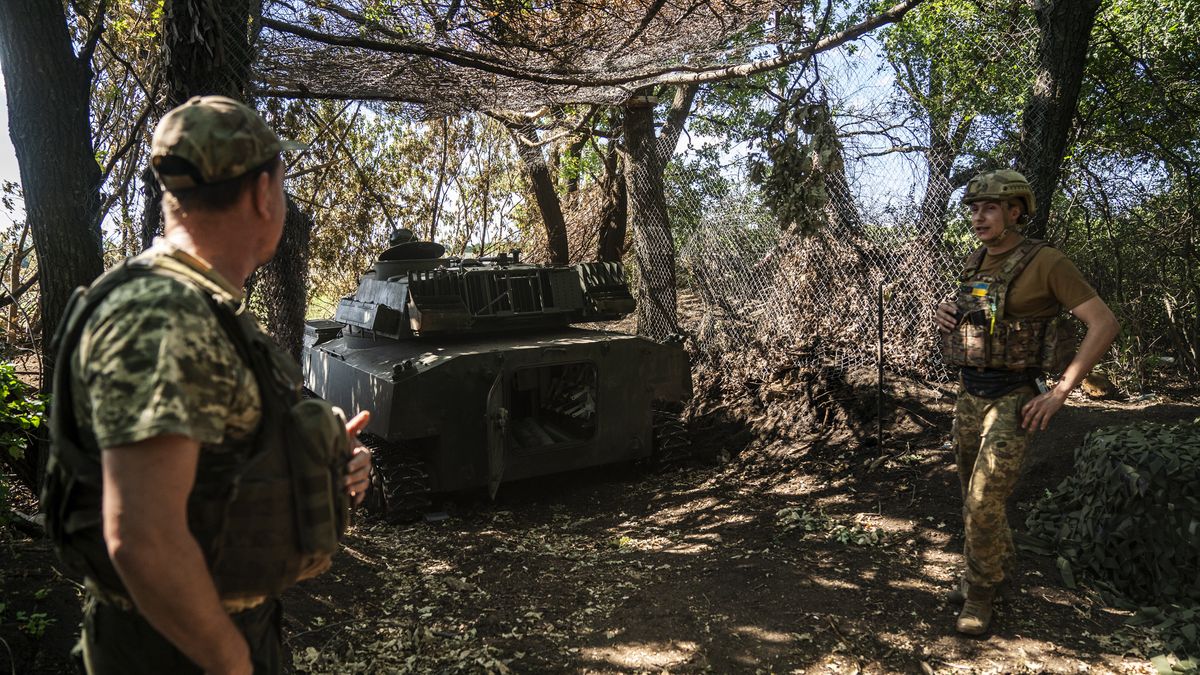 DONETSK OBLAST, UKRAINE - JUNE 29: Ukrainian soldiers waiting for the order to fire an artillery position with a Soviet-made 2C1 tank in Donetsk oblast, Ukraine, June 29, 2024. As the Russian army intensifies shelling, the siege of the town of Chasiv Yar is very intense. (Photo by Jose Colon/Anadolu via Getty Images)