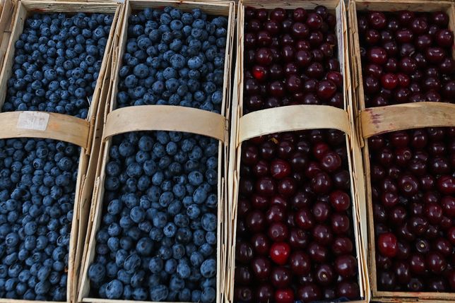 Freshly picked cherry and blueberry baskets for sale in the Rzeszow market.On Thursday, July 28, 2022, in Rzeszow, Subcarpathian Voivodeship, Poland. (Photo by Artur Widak/NurPhoto via Getty Images)