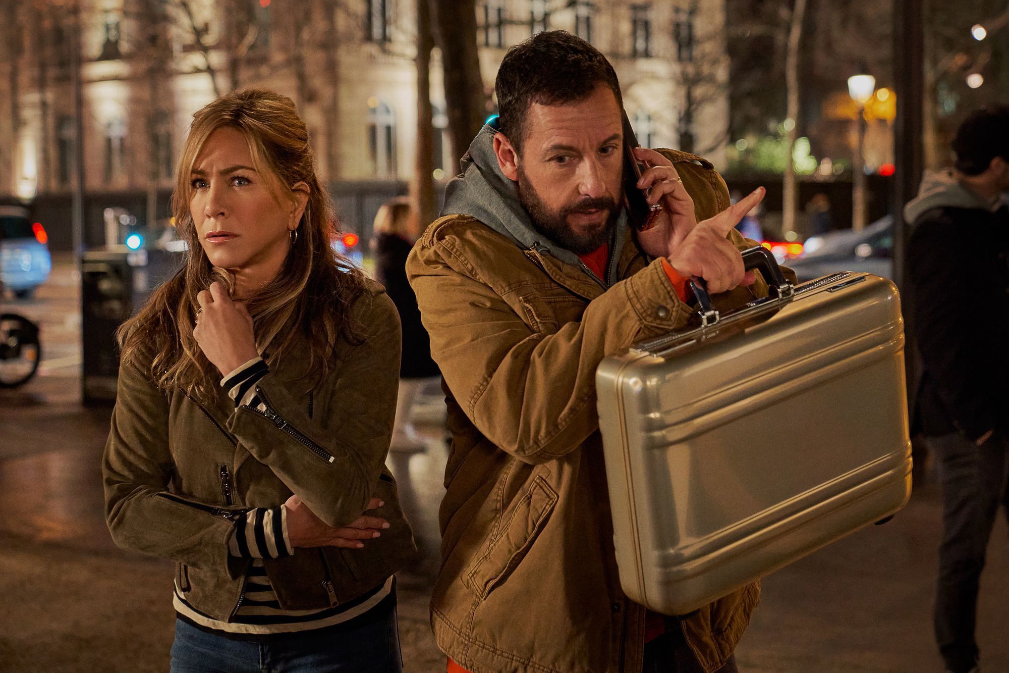 Murder Mystery 2Murder Mystery 2. (L-R) Jennifer Aniston as Audrey Spitz and Adam Sandler as Nick Spitz in Murder Mystery 2. Cr. Scott Yamano/Netflix © 2022.