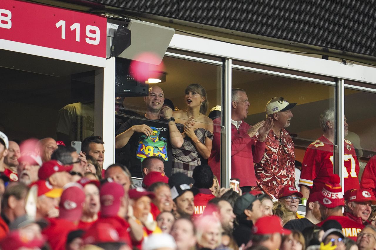 KANSAS CITY, MO - OCTOBER 07:  Taylor Swift looks on from the stands during an NFL football game between the New Orleans Saints and the Kansas City Chiefs at GEHA Field at Arrowhead Stadium on October 7, 2024 in Kansas City, Missouri. (Photo by Cooper Neill/Getty Images)