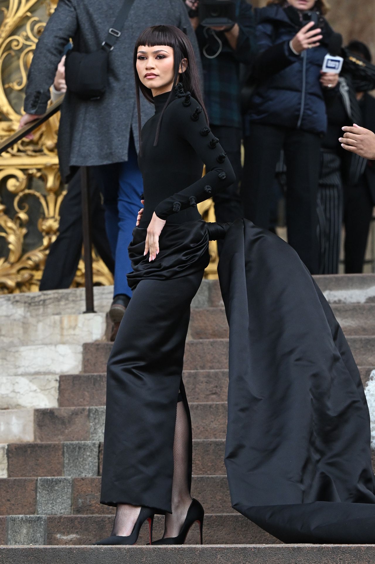 Zendaya in a black creation at the Schiaparelli show