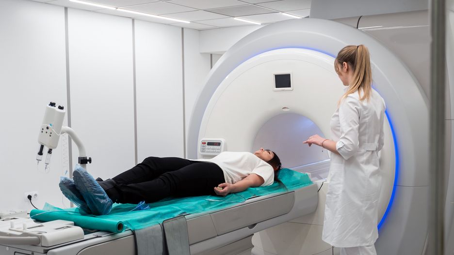 Female patient undergoing MRI - Magnetic resonance imaging in Hospital. Medical Equipment and Health CareFemale patient undergoing MRI - Magnetic resonance imaging in Hospital. Medical Equipment and Health Care.sinenkiymedical, computer, cat, office, technology, construction, doctor, imaging, clinic, x-ray, oncology, cancer, medicine, equipment, machine, diagnostic, health care, magnetic, toning, treatment, magnetic resonance imaging, clean, scan, green, hospital, blue, patient, radiology, examination, scanner, white, headache, mri, health, people, care, ct, resonance, single, neural, spherical, explaining, inside, recovery, positron, concepts, ultra, illness, indoors, contemporary, medical, computer, cat, office, technology, construction, doctor, imaging, clinic, x-ray, oncology, cancer, medicine, equipment, machine, diagnostic, health care, magnetic, toning, treatment, magnetic resonance imaging, clean, scan, green, hospital, blue, patient, radiology, examination, scanner, white, headache, mri, health, people, care, ct, resonance, single, neural, spherical, explaining, inside, recovery, positron, concepts, ultra, illness, indoors, contemporary