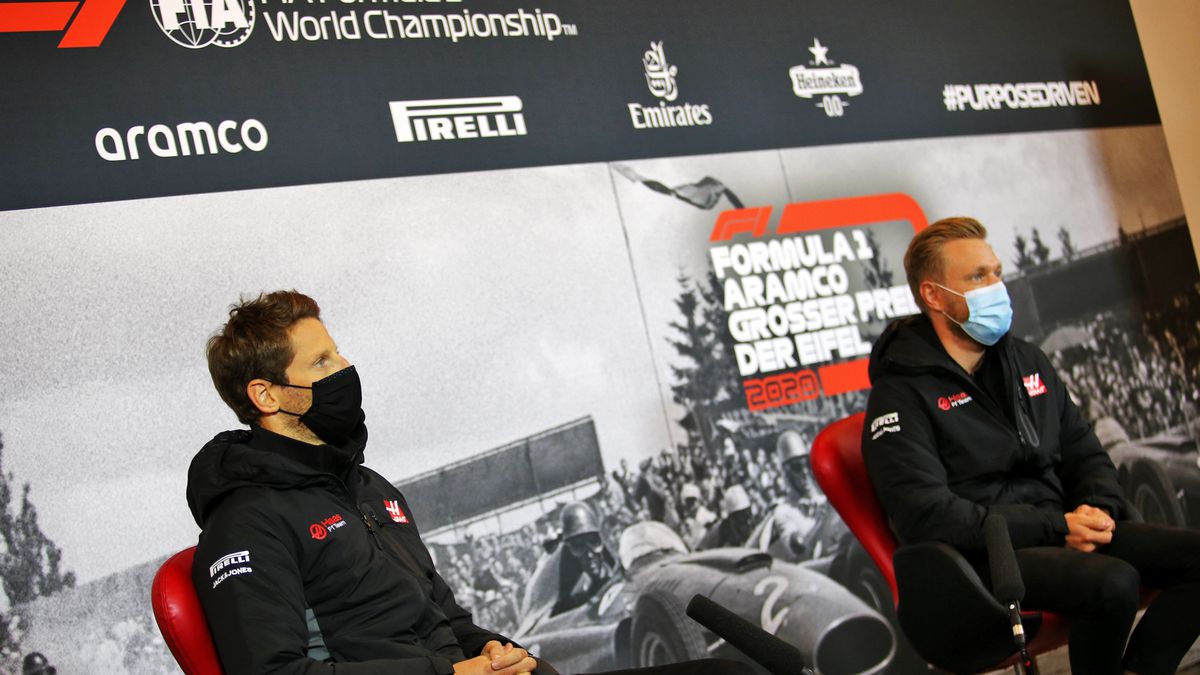 Romain Grosjean (po lewej) i Kevin Magnussen