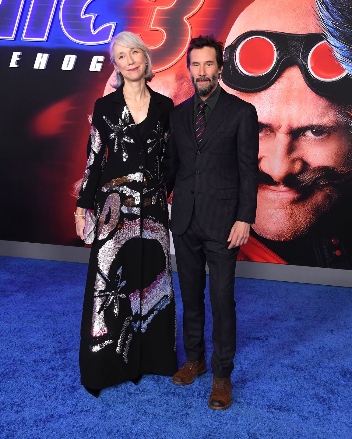 Keanu Reeves z ukochaną razem na ściance