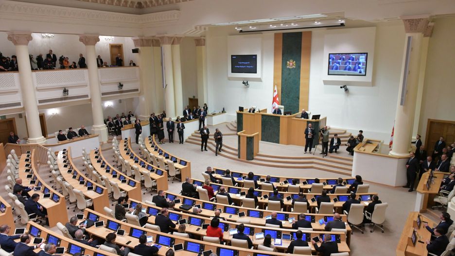 Temporary
This handout photograph taken on November 25, 2024 and released by the press service of the Parliament of Georgia shows a general view of Georgia's new Parliament as it holds its first session in Tbilisi on November 25, 2024. Georgia's new parliament convened for its first session on November 25, 2024, amid protests over an election the opposition says was rigged and after the pro-European president demanded the result be annulled. (Photo by Handout / PRESS SERVICE OF THE PARLIAMENT OF GEORGIA / AFP) / RESTRICTED TO EDITORIAL USE - MANDATORY CREDIT "AFP PHOTO / PRESS SERVICE OF THE PARLIAMENT OF GEORGIA" - NO MARKETING NO ADVERTISING CAMPAIGNS - DISTRIBUTED AS A SERVICE TO CLIENTS
HANDOUT