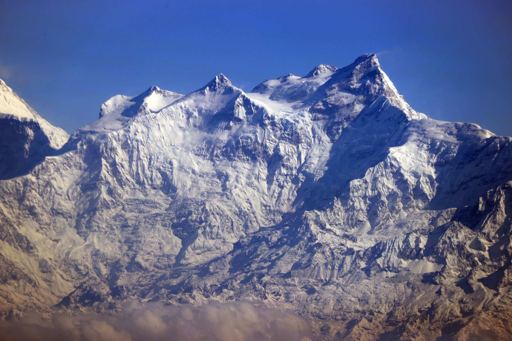 NEPAL - APRIL 19 : An aerial view of snowcapped Himalayan peaks in Nepal on April 19, 2021. Himalayas is a mountain range in South and East Asia separating the plains of the Indian subcontinent from the Tibetan Plateau. The range has many of Earth's highest peaks, including the highest, Mount Everest, at the border between Nepal and China. (Photo by Ozkan Bilgin/Anadolu Agency via Getty Images)