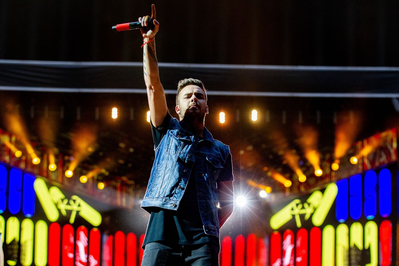 AMSTERDAM, NETHERLANDS - JUNE 24: Liam Payne of One Direction performs live on stage at Amsterdam Arena on June 24, 2014 in Amsterdam, Netherlands. (Photo by Paul Bergen/Redferns)