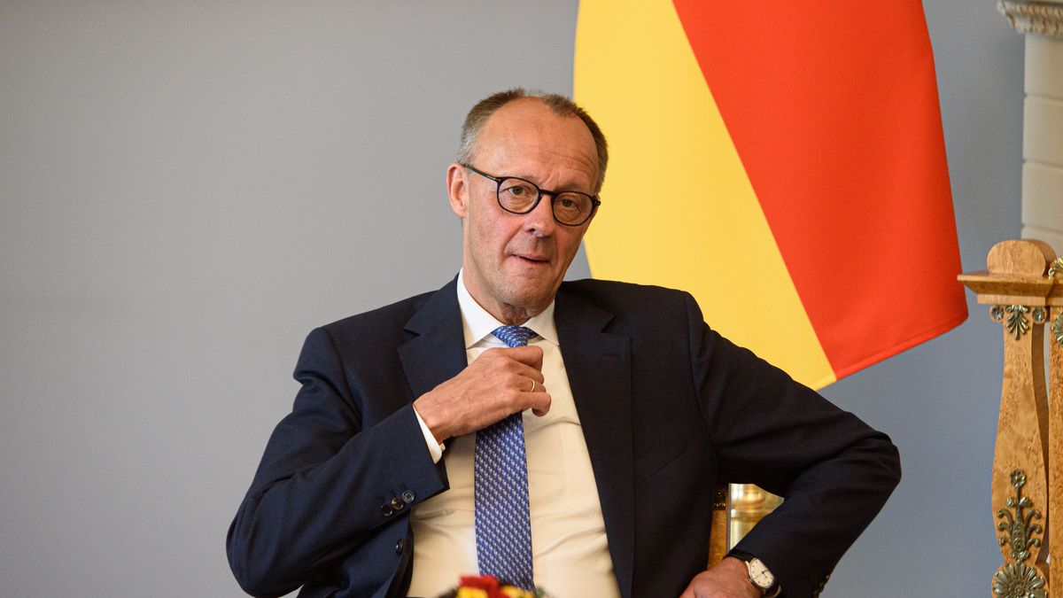VILNIUS, LITHUANIA - 2025/05/22: German Chancellor Friedrich Merz adjusts his tie during the bilateral meeting at the Presidential Palace. German Federal Chancellor Friedrich Merz held a meeting with Lithuanian President Gitanas Nauseda at the Presidential Palace in Vilnius. His visit to Lithuania was timed to the formal inauguration of the German 45th Armored Brigade "Lithuania.". (Photo by Yauhen Yerchak/SOPA Images/LightRocket via Getty Images)