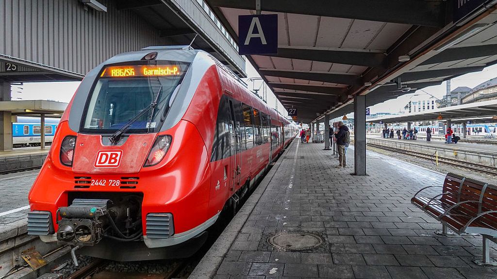 Regional Trains At Munich Central Station
A Deutsche Bahn regional train RB6 to Garmisch-Partenkirchen stands at a platform at Munich Central Station in Munich, Bavaria, Germany, on January 10, 2026. The railway company provides essential transit links between the city and the Alpine region. (Photo by Michael Nguyen/NurPhoto via Getty Images)
NurPhoto
terminal, public transport, platform, red train, railway, transport, transit, rail network, regional express, rail infrastructure, economic, destination, rail travel, logistics, train to garmisch, central station, january 10, train, railroad, regional train, railway company, mobility, werdenfelsbahn, european railways, train station, db regio, commuting, munich central station, track, db, german railways