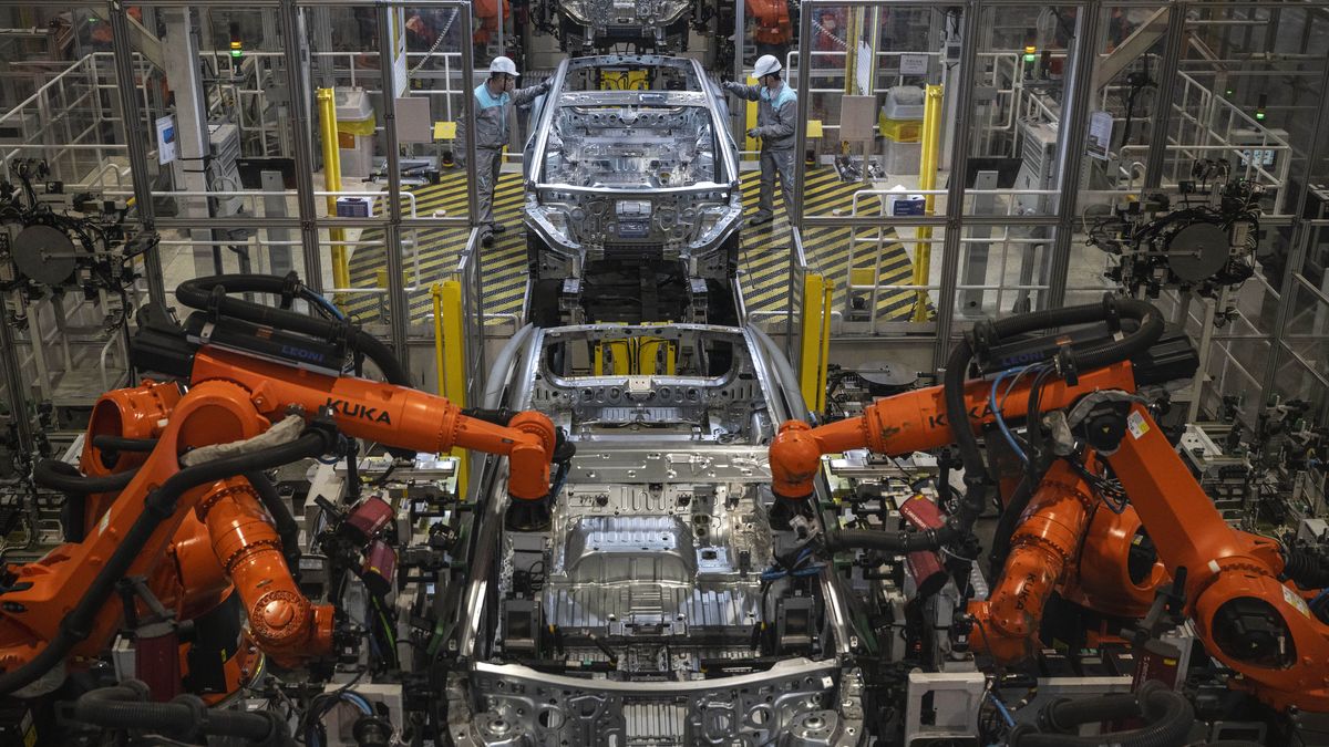 HEFEI, CHINA - JANUARY 17: Workers from Chinese electric vehicle (EV) company NIO work on an automated production line at the companys manufacturing hub on January 17, 2025 in Hefei, China. China produces and exports more electric vehicles than any other country, leading the global electric vehicle (EV) market with production capacity that now outpaces domestic sales. Luxury brand NIO saw a 38% rise in EV deliveries in 2024 and is looking to further its expansion into overseas markets with a range of premium vehicles, a new lower priced sub-brand, and its battery swapping charging system. Exports of Chinese EVs exceeded two million for the first time in 2024, according to government figures. While the global expansion of Chinas EV industry has triggered trade tensions with the U.S. and Europe where governments are enacting tariffs on China-made electric cars, the companies are making inroads in markets in Asia, South America, and Africa. Chinese brands have become known worldwide for design and advanced EV technology at competitive prices, as they continue to fuel a transition to electric vehicles at home in the worlds largest car market. (Photo by Kevin Frayer/Getty Images)