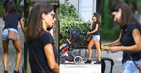 Opalona Marta Kaczyńska spaceruje z synem, rozmawiając przez telefon (ZDJĘCIA)