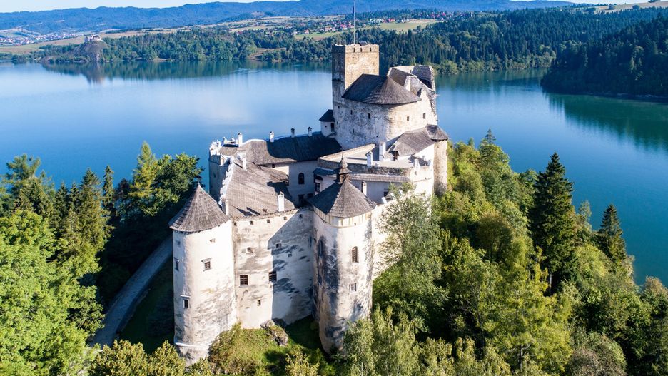 Poland. Medieval Castle in Niedzica, dating back to 14th century (upper castle), Polish or Hungarian in the Past. Artificial Czorsztyn Lake and far view of the ruins of Czorsztyn castle. Aerial view in the morningKrzysztof NahlikPoland,Niedzica,castle,medieval,aerial view,drone,Czorsztyn,lake,artificial,water,hill,steep,rock,cliff,architecture,landscape,birds eye view,middle ages,ruins,fortress,fort,stronghold,tower,bastille,defensive,wall,stone,palace,tourist attraction,sightseeing,travel,tourism,Dunajec,Europe,Polish,Hungarian,European,mountains,history,historic,shore,forest,wood,tree,Pieniny,Gorce,sunshine,poland,niedzica,castle,medieval,aerial view,drone,czorsztyn,lake,artificial,water,hill,steep,rock,cliff,architecture,landscape,birds eye view,middle ages,ruins,fortress,fort,stronghold,tower,bastille,defensive,wall,stone,palace,tourist attraction,sightseeing,travel,tourism,dunajec,europe,polish,hungarian,european,mountains,history,historic,shore,forest,wood,tree,pieniny,gorce,sunshine