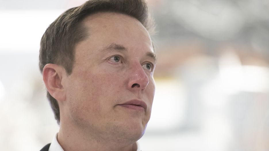 SpaceX Chief Engineer Elon Musk speaks in front of Crew Dragon cleanroom at SpaceX Headquarters in Hawthorne, California on October 10, 2019. (Photo by Yichuan Cao/NurPhoto via Getty Images)