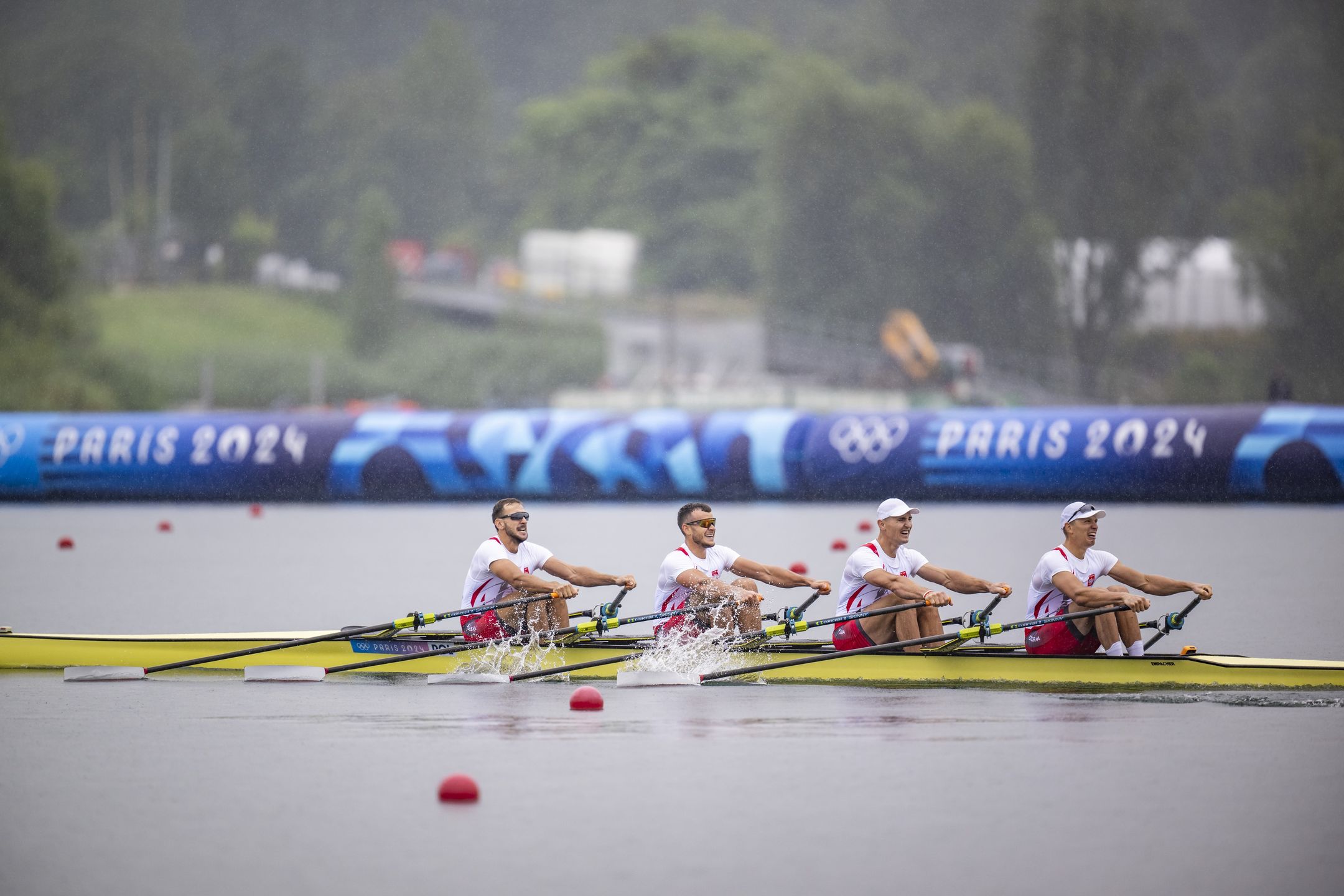PARIS, FRANCE - JULY 27: Dominik Czaja, Mateusz, Miroslaw Zietarski and Fabian Baranski of Team Poland compete in the Men’s Quadruple Sculls Heat during on day one of the Olympic Games Paris 2024 at Vaires-Sur-Marne Nautical Stadium on July 27, 2024 in Paris, France. (Photo by Kevin Voigt/GettyImages)