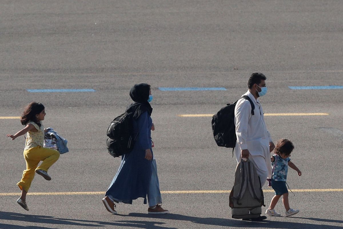 Zachowanie Afganki po wyjściu z samolotu. To zdjęcie podbija światowe media 