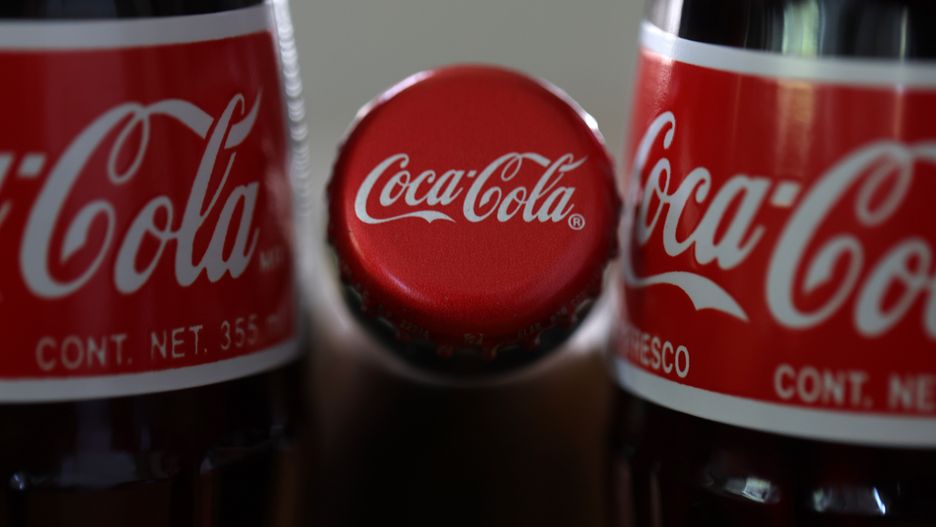SAN ANSELMO, CALIFORNIA - APRIL 24: In this photo illustration, bottles of Coca Cola are displayed on April 24, 2023 in San Anselmo, California. Coca-Cola reported first-quarter earnings that beat analyst expectations with revenues of $10.96 billion compared to the expected $10.8 billion. (Photo Illustration by Justin Sullivan/Getty Images)