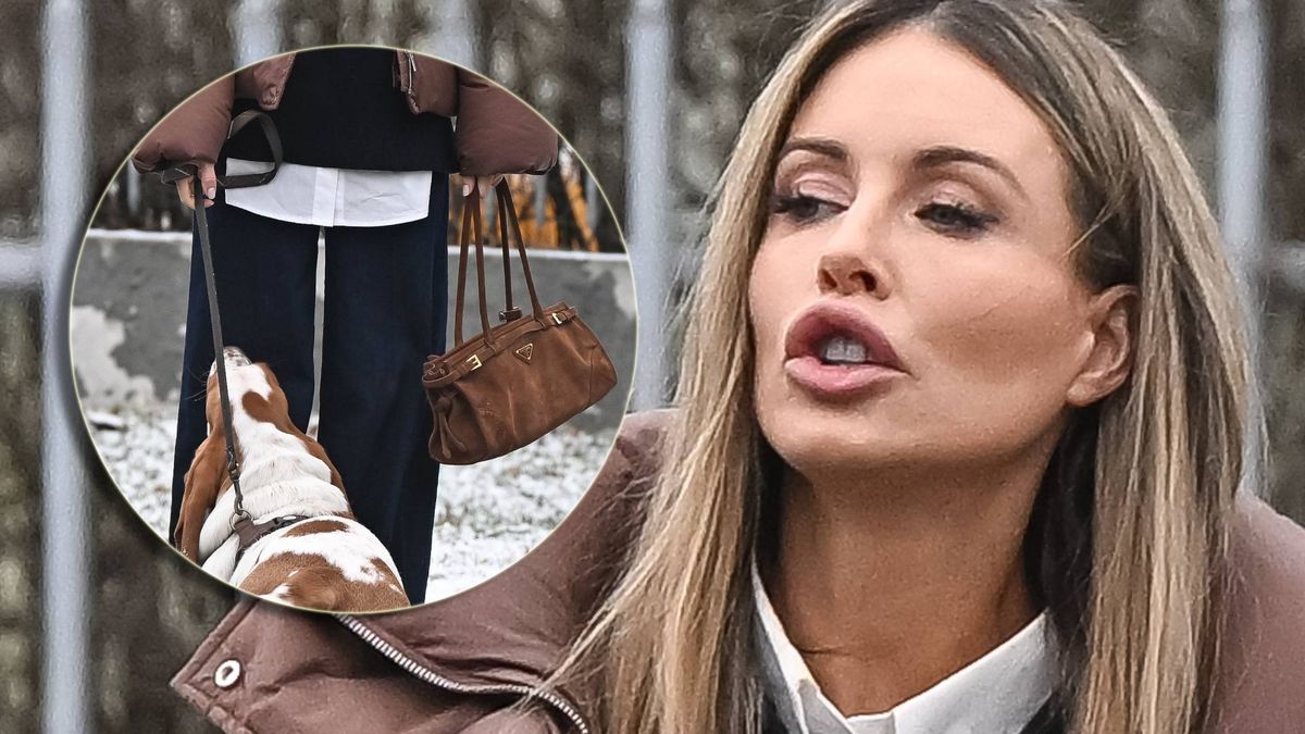 Rozenek, spacer z luksusową torebką