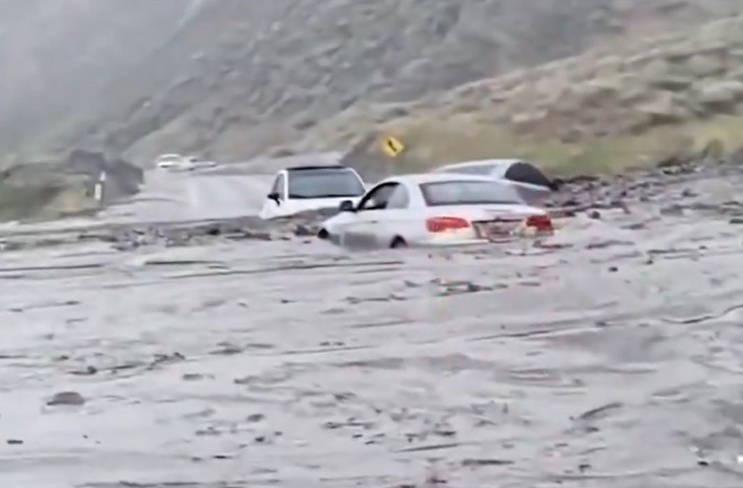 Avalanche in California. Cars got stuck in the mud.