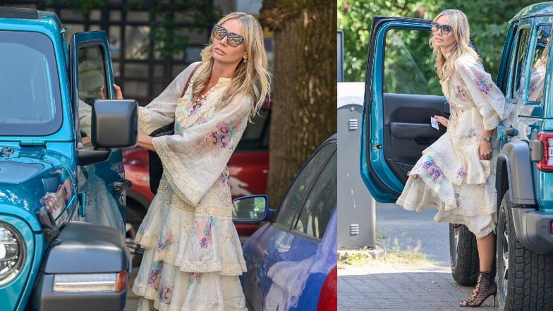 Agnieszka Woźniak-Starak w falbanach przeskakuje ogrodzenie w drodze do swego turkusowego Jeepa (ZDJĘCIA)