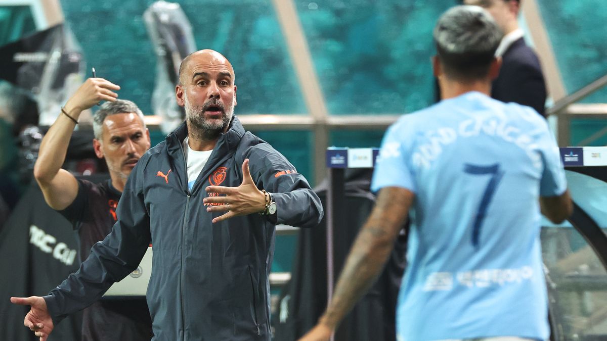 Getty Images / Robbie Jay Barratt - AMA / Na zdjęciu: Pep Guardiola i Joao Cancelo