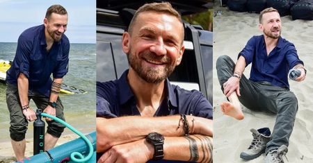 Zadowolony Przemysław Kossakowski pompuje sprzęt do kitesurfingu (ZDJĘCIA)