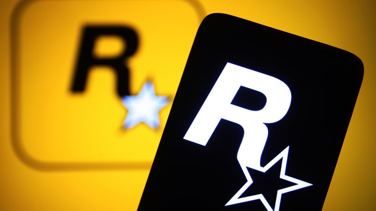 UKRAINE - 2022/02/11: In this photo illustration, a Rockstar Games Inc logo of a video game publisher is seen on a smartphone and a computer screen. (Photo Illustration by Pavlo Gonchar/SOPA Images/LightRocket via Getty Images)