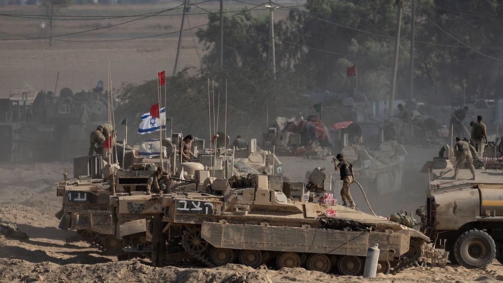 'Full Occupation' Of Gaza To Be Proposed By Israeli Prime Minister Benjamin Netanyahu
SOUTHERN ISRAEL, ISRAEL - AUGUST 6: Israeli soldiers organize military equipment while standing on armored personnel carriers near the border with the Gaza Strip on August 6, 2025 in Southern Israel, Israel. According to Israeli media reports, senior officials have confirmed Prime Minister Benjamin Netanyahu intends to seek backing from his security cabinet for the "full occupation" of the Gaza Strip, despite dissent within his staff and condemnation by the international community. UN Assistant Secretary General Miroslav Jenca has warned that the plan could endanger the lives of more Palestinians and Israeli hostages held by Hamas. (Photo by Amir Levy/Getty Images)
Amir Levy