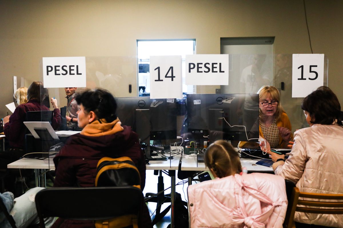 Refugees from Ukraine who fled to Poland after Russian attack are seen at the register point in Tauron Arena to obtain a PESEL national identification number and remain in the country. Krakow, Poland on April 13, 2022. Russian invasion on Ukraine causes a mass exodus of refugees to Poland.   (Photo by Beata Zawrzel/NurPhoto via Getty Images)