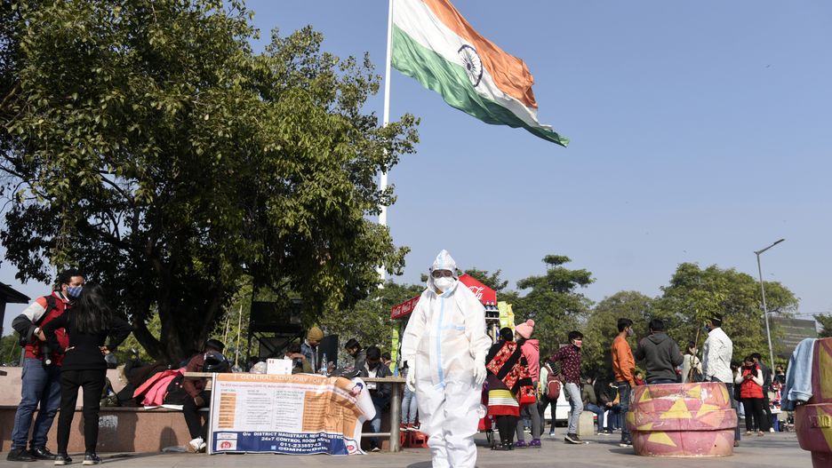A health worker sitting as she is waiting for people to take swab sample for COVID-19 test, at Counnaught Place in New Delhi on 12 January 2021.   (Photo by David Talukdar/NurPhoto via Getty Images)