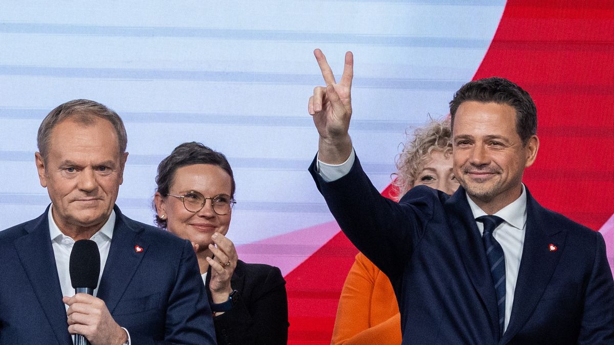Polish PM Donald Tusk and Mayor Rafal Trzaskowski (R) celebrate after Trzaskowski win in the Civic Platform primary with over 75% votes and becoming the party's nominee for the 2025 presidential election in Warsaw, Poland, on November 23, 2024. (Photo by Andrzej Iwanczuk/NurPhoto via Getty Images)
