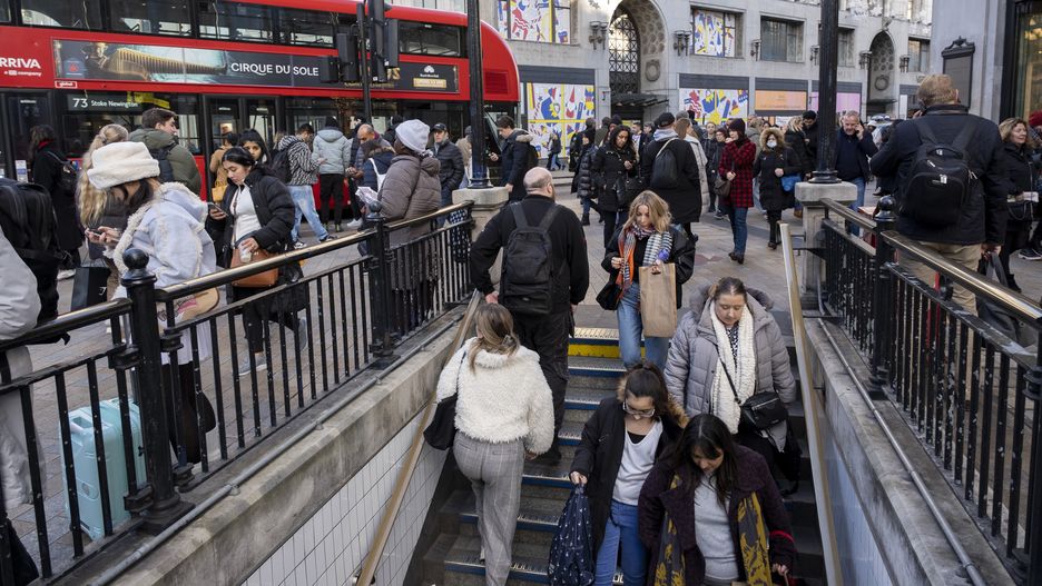 People take the steps down to Oxford Circus underground station on Oxford Street as Christmas shopping crowds increase on 6th December 2022 in London, United Kingdom. Oxford Street is a major retail centre in the West End of the capital and is Europes busiest shopping street with around half a million daily visitors to its approximately 300 shops, the majority of which are fashion and high street clothing stores. (photo by Mike Kemp/In Pictures via Getty Images)