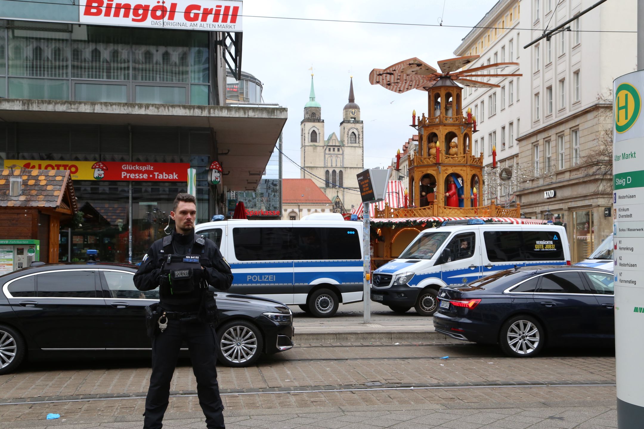 MAGDEBURG, GERMANY - DECEMBER 21: Police officers take measures as German Chancellor Olaf Scholz visits the Christmas market after a car drove into the crowd in Magdeburg, Germany, on December 21, 2024. The death toll from the deadly car attack at a Christmas market in the German city of Magdeburg rose to four, and over 200 others have been injured, local media reported on Saturday. (Photo by Somaya Abdelrahman/Anadolu via Getty Images)