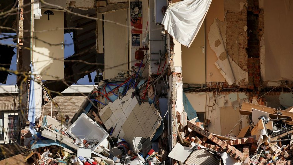 TemporaryRubble is scattered in apartments of a building after a blast occurred in Turnhout, Belgium, Friday, Dec. 31, 2021. Rescue services said it was still unclear what caused the blast or if there are casualties. (AP Photo/Olivier Matthys)AP