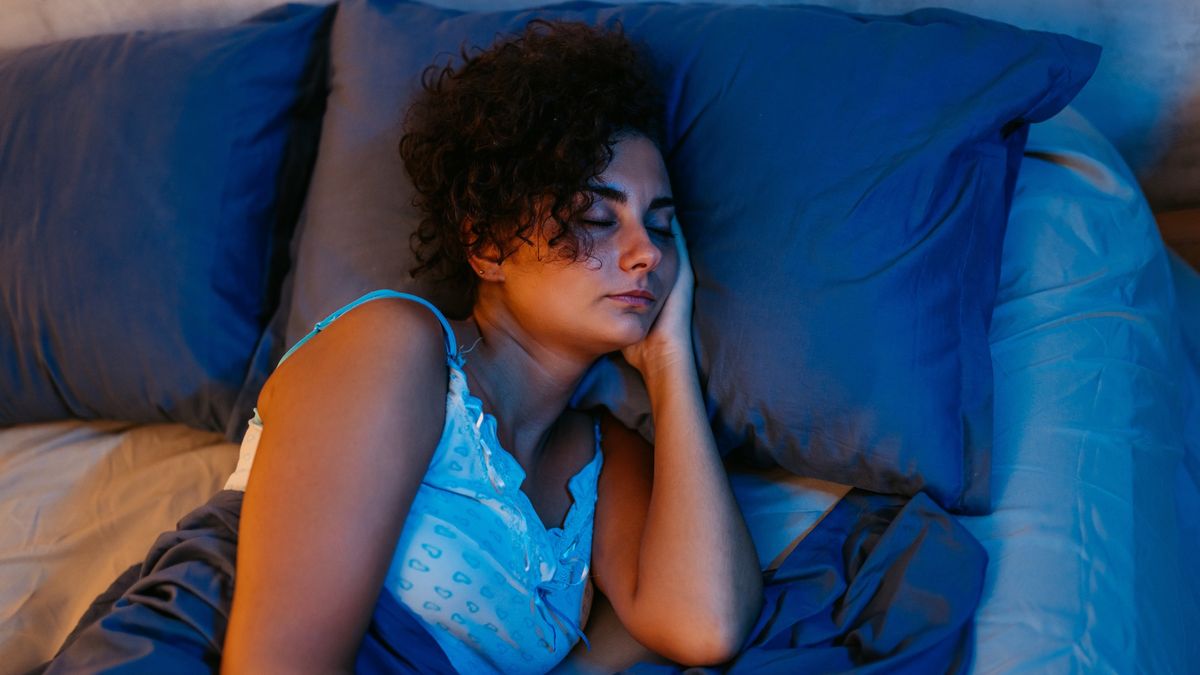 Young Woman Sleeping In The Bed At Night
Young woman sleeping in the bed at night in her bedroom.
urbazon