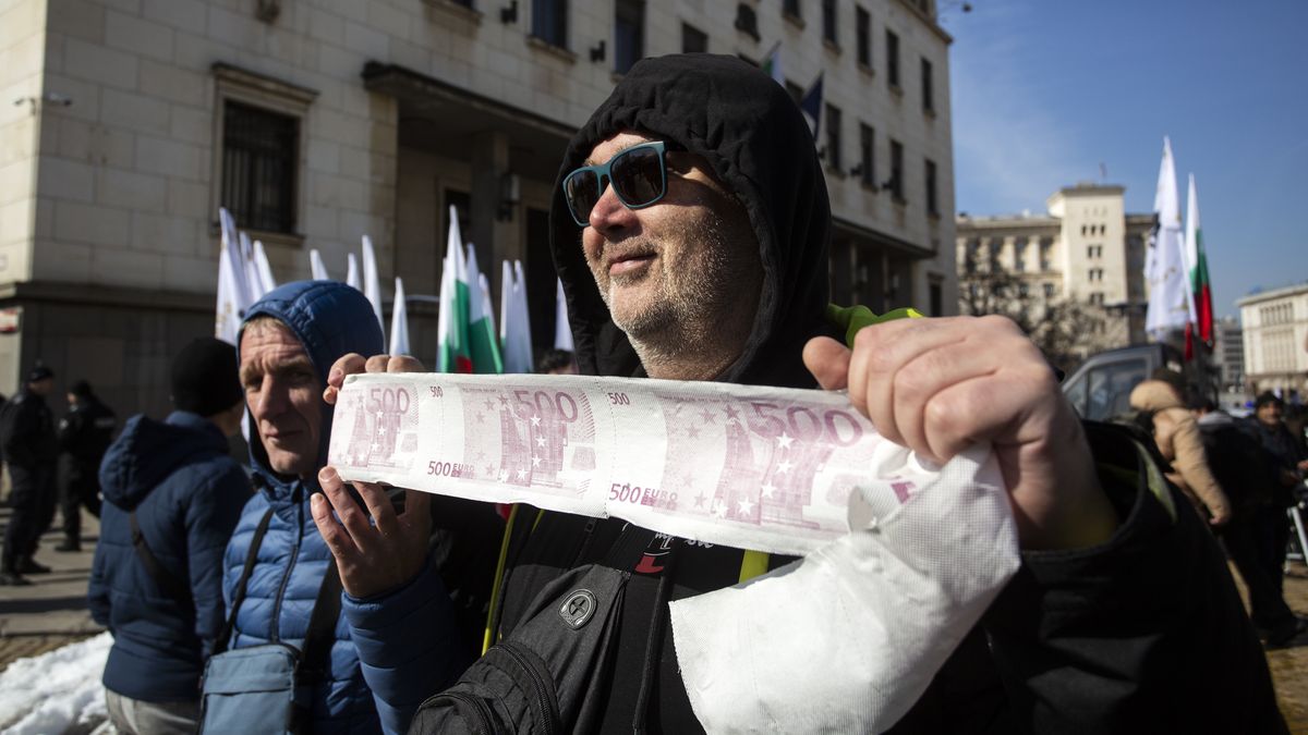 SOFIA, BULGARIA - FEBRUARY 22: Far-right supporters attend a protest in defense of the Bulgarian Lev and against the introduction of the Euro outside the Bulgarian National Bank (BNB) and the Representation of the European Commission, organized by far-right and ultranationalist political party in 'Revivla' in Sofia, Bulgaria on February 22, 2025. (Photo by Hristo Vladev/Anadolu via Getty Images)
