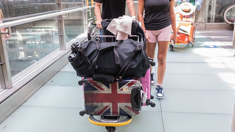 Travelers carrying their suitcases heading for check in atMADRID, SPAIN - 2025/08/02: Travelers carrying their suitcases heading for check in at Adolfo Suarez Madrid-Barajas Airport. The airport today recorded its busiest flight schedule of the summer, with more than 7,000 operations coinciding with the start of summer vacations for many tourists. (Photo by Marcos del Mazo/LightRocket via Getty Images)Marcos del Mazotransports, tourists, aviation, airlines, traveling, vacation, holidays, adolfo suarez madrid-barajas airport, travelers