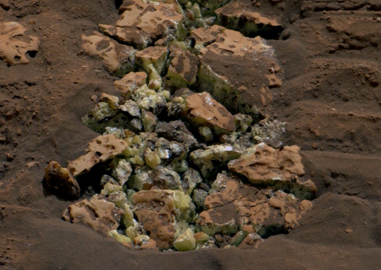 The Mars rover broke the rock.