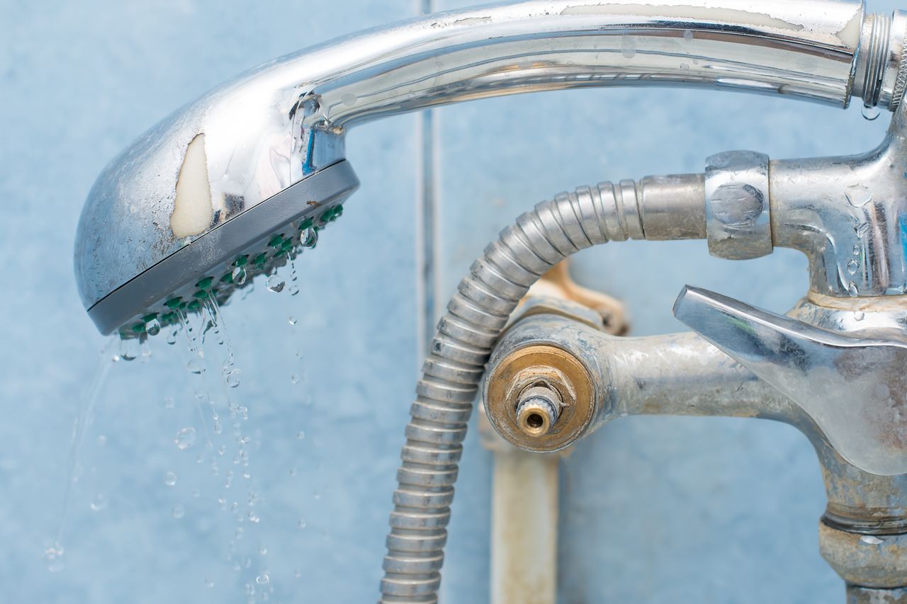 A way to tackle limescale and deposits under the shower cabin.